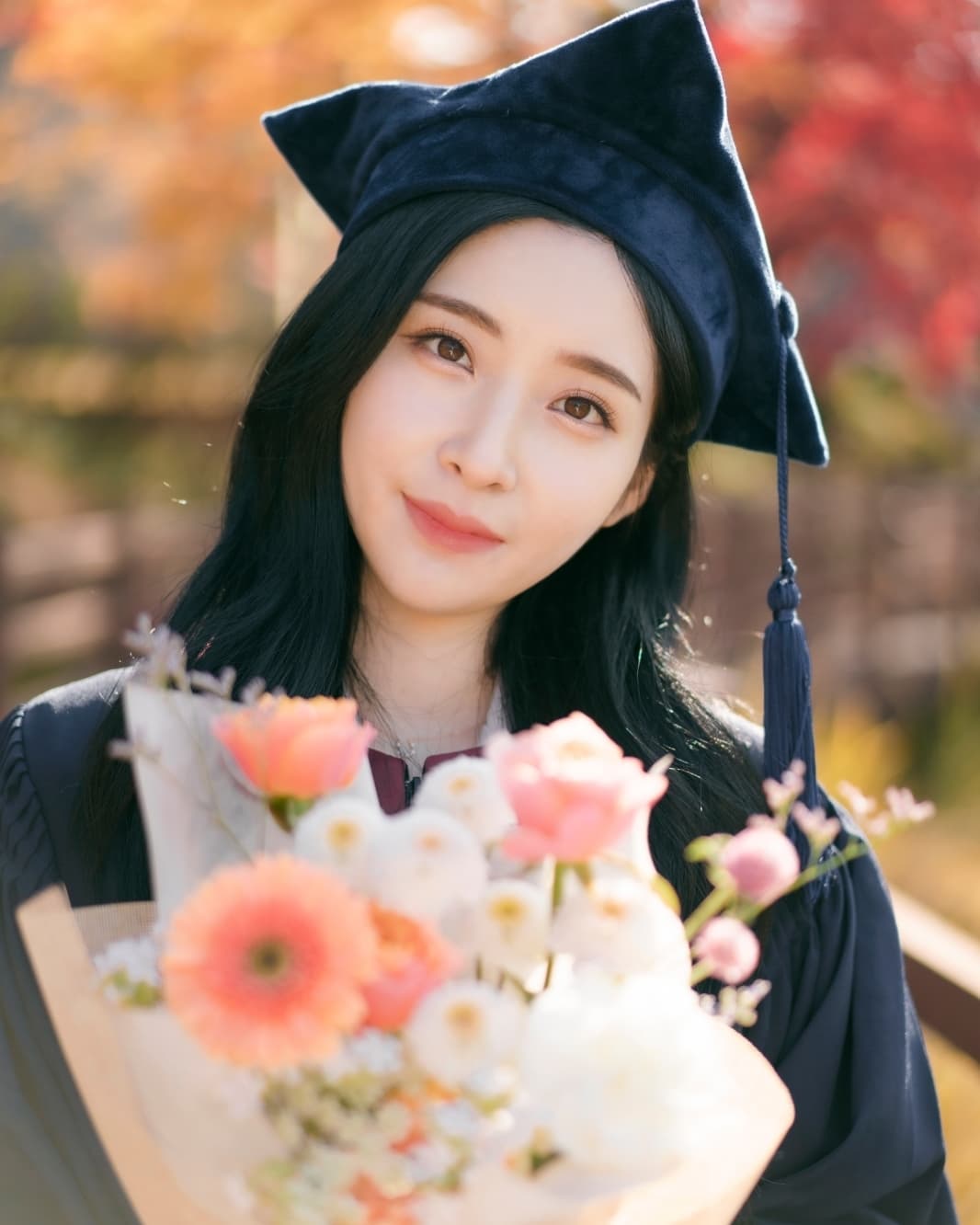 👩‍🎓