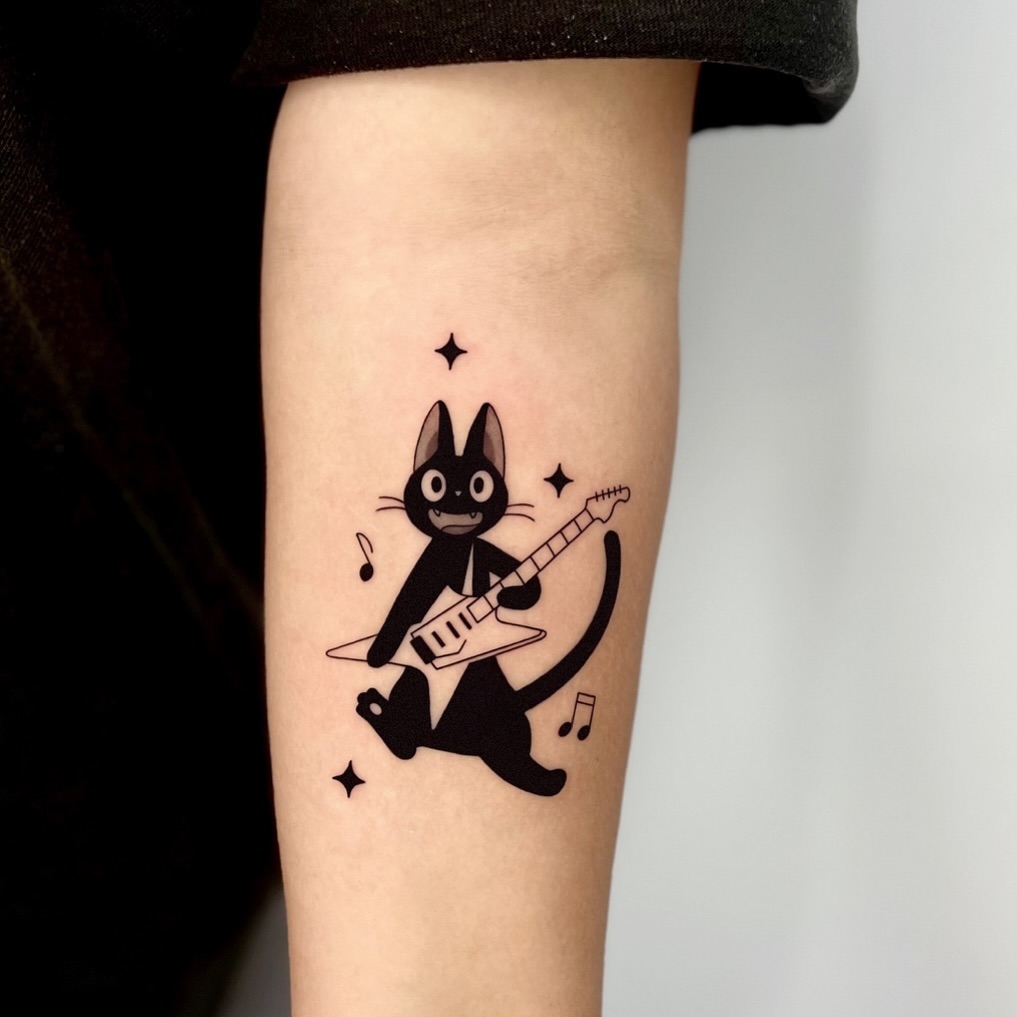 첫타투🎸🐈‍⬛🎵🎶🖤